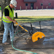 Operator wet cutting a slab with the FSB-150H