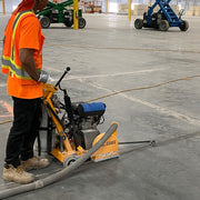 JS-160 milling a control joint with dust collection hose attached