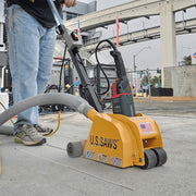 Operator milling a joint with the MC-60 under an overpass