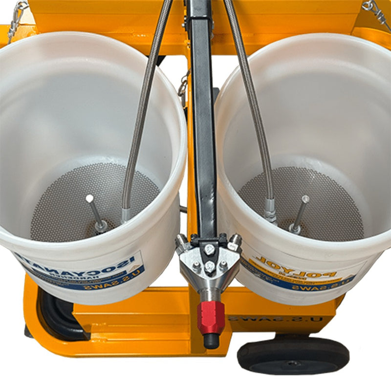 Top view into the One Man Polymer Pump twin tanks with mixing paddles