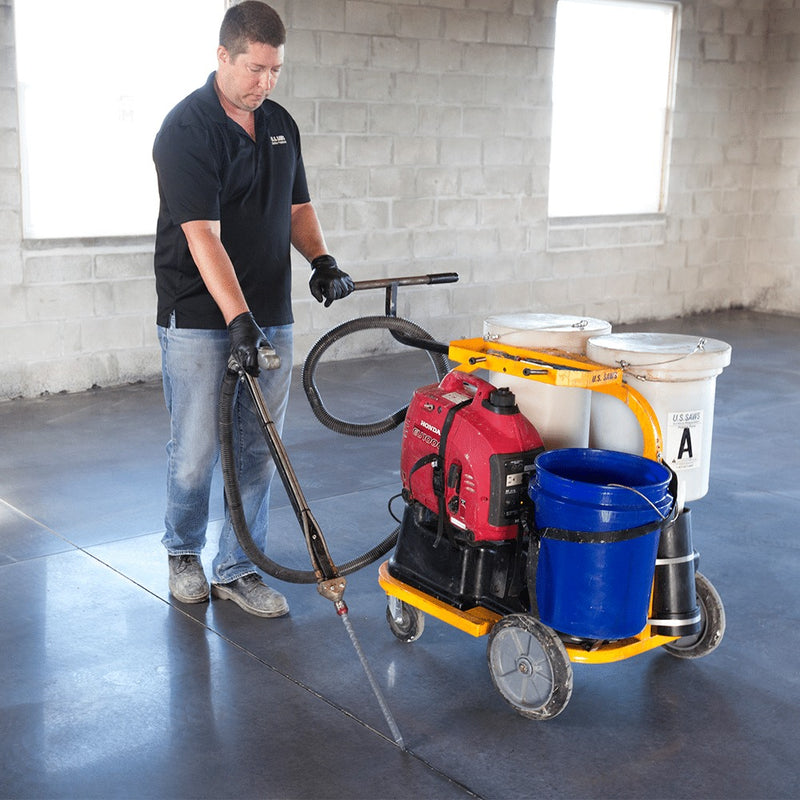 Operator dispensing joint filler from the One Man Polymer Pump with onboard generator