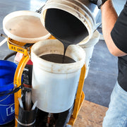 Pouring component material into the One Man Polymer Pump tank