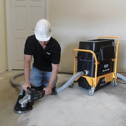 Operator hand grinding with hose to the Ultra Vac 1250