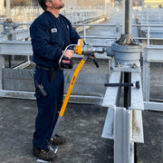 Maintenance kit powerhead on a valve stem along a treatment plant rail